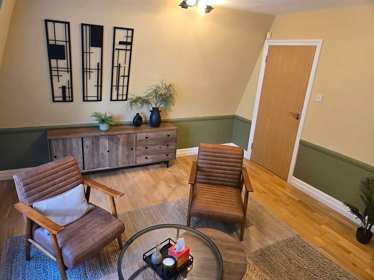 Another view of The Croydon Space: two armchairs facing each other beside a low table